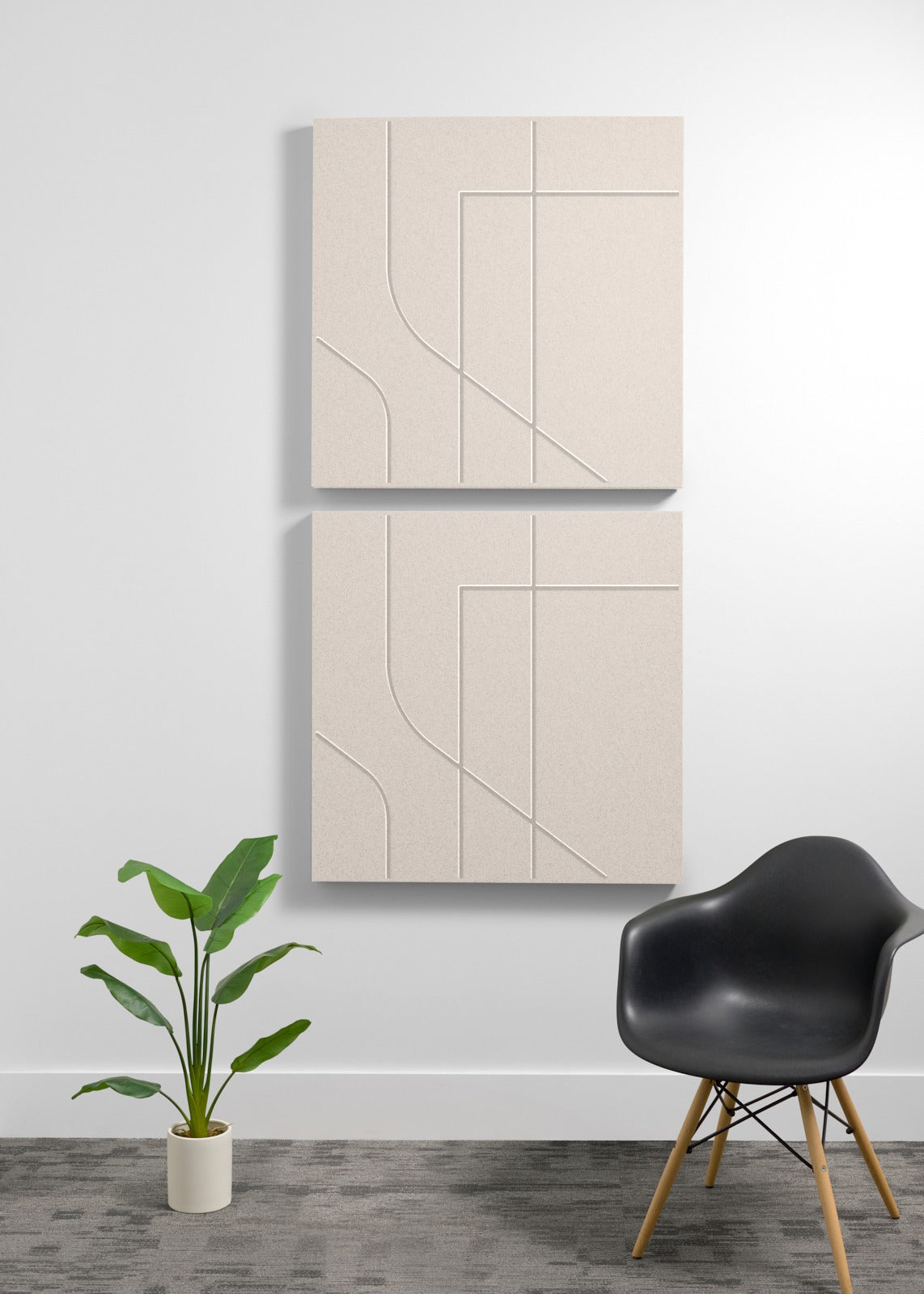 Two stacked beige acoustic wall panels with engraved geometric subway tile pattern and curved line designs.
