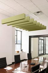 Green felt acoustic beams suspended from ceiling in staggered arrangement above conference table.