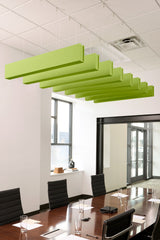 Lime green felt acoustic beams suspended horizontally from white drop ceiling in modern office conference room.