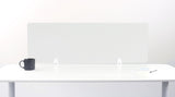 White desk divider panel with two support brackets mounted on desk surface, with mug and papers on either side.