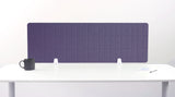 Purple grid desk divider with vertical ribbed texture mounted on white desk with metal brackets.