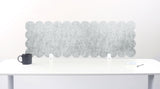 Decorative headboard with a honeycomb pattern on a white background