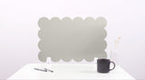 Decorative wall art with cloud-like pattern on a white background