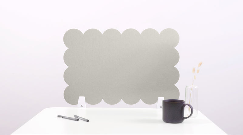 Decorative wall art with cloud-like pattern on a white background