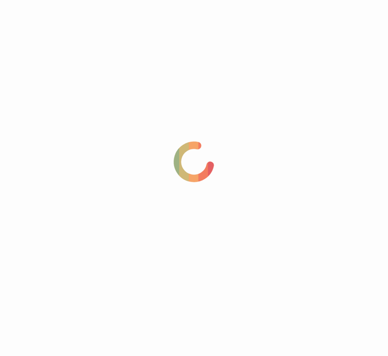 Curved letter C with gradient color transitioning from green to orange and red on light background.
