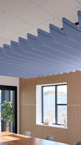 Purplish-blue acoustic ceiling blade baffles suspended from the ceiling, installed in a conference room. Felt Right's acoustic blade baffles absorb 65% of sound waves, making office spaces quieter and feel more calm.