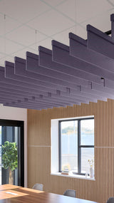 Soft violet acoustic ceiling blade baffles suspended from the ceiling, installed in a conference room. Felt Right's acoustic blade baffles absorb 65% of sound waves, making office spaces quieter and feel more calm.