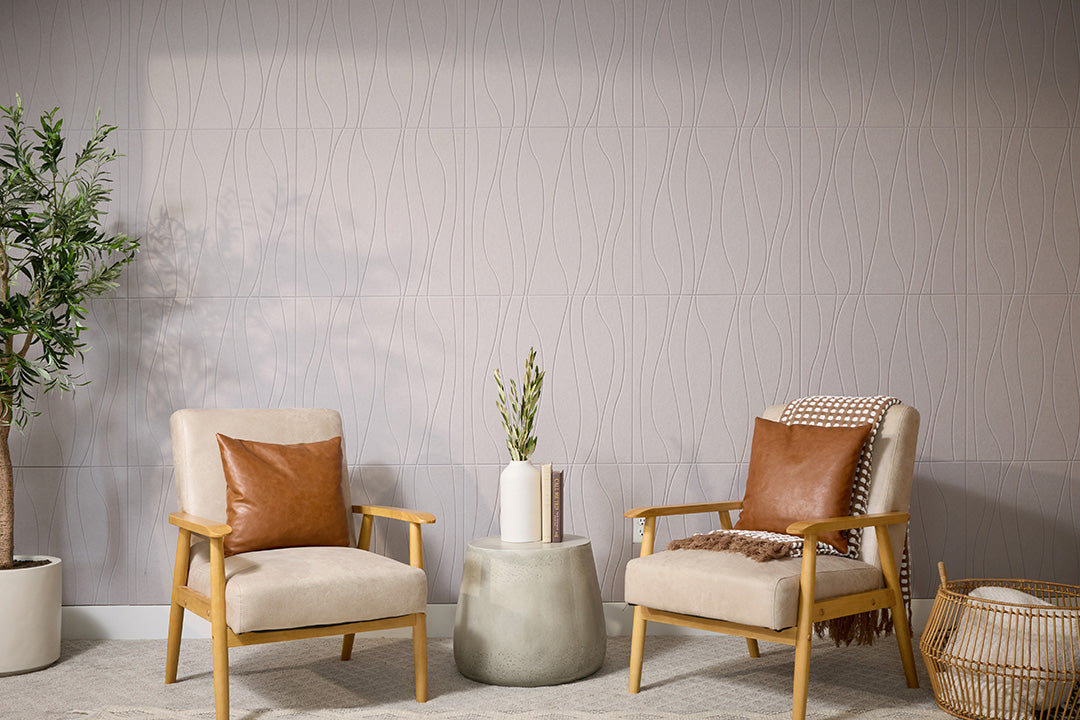 Gray wallpaper alternative PET Felt with vertical wavy line pattern displayed on wall behind two wooden chairs with tan cushions and cognac leather