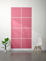 pink blank tiles on a white wall
