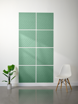 Green tiles with diagonal engraved chevron pattern arranged in a 2x4 grid with white grout lines.