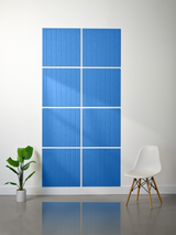 Blue tile with vertical parallel line engravings arranged in a 2x4 grid installation on a wall.