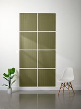 Eight sage green tiles arranged in a 2x4 grid with engraved vertical parallel lines and white grout lines between tiles.