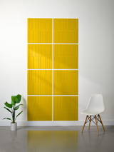 Eight yellow tiles with engraved vertical line pattern arranged in a 2x4 offset grid with white grout lines.