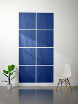 Eight blue engraved tiles with vertical line pattern arranged in offset grid layout on wall.