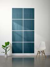 Eight teal-blue engraved tiles arranged in a 2x4 grid pattern with offset vertical line designs.