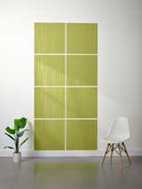 Eight chartreuse tiles with vertical engraved lines arranged in a 2x4 grid with white grout lines.