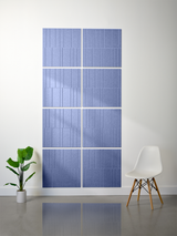 Blue ceramic tiles arranged in offset pattern with vertical line engravings and white grout joints.