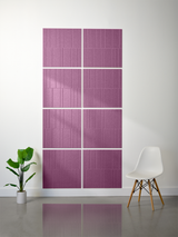 Purple engraved tiles arranged in offset pattern on wall, each tile 2'x2' with vertical line detailing.