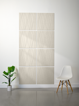 Beige ceramic tiles with wavy line engraving pattern arranged in 2x4 grid on wall.