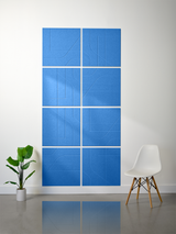Blue subway tile grid with engraved curved and geometric line patterns arranged in 2x2 tile layout.