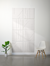 Four white subway tiles with engraved line patterns arranged in a 2x2 grid on a wall.