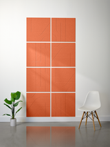 Eight orange subway tiles arranged in a 2x4 grid with engraved line patterns on each tile.