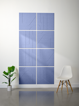Blue subway tiles arranged in 2x2 grid pattern with engraved line designs and white grout lines.
