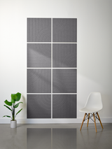 Gray tile grid with engraved vertical lines and curved arc patterns forming geometric design across eight panels.