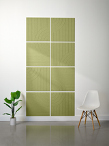 Eight-tile green ceramic wall installation with engraved linear and curved geometric patterns arranged in a 2x4 grid.