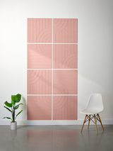 Four pink tiles arranged in a 2x2 grid, each with engraved vertical lines and curved arc patterns.