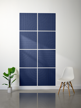 Eight dark blue tiles arranged in a 2x4 grid with engraved linear and curved geometric patterns.