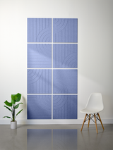 Blue ceramic tile with engraved linear and curved tangent line pattern, displayed as eight-panel wall installation.