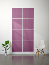 Eight mauve tiles with engraved vertical lines and curved arc patterns arranged in a 2x4 grid on white wall.