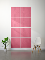 Eight pink tiles with engraved arch and line patterns arranged in a 2x4 grid on a wall.