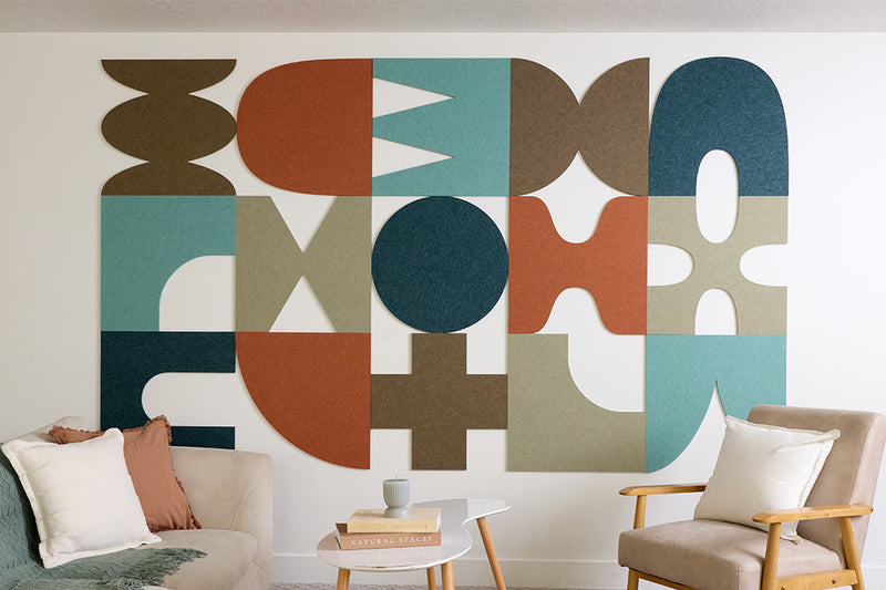 Colorful abstract wall art in a living room setting with furniture.