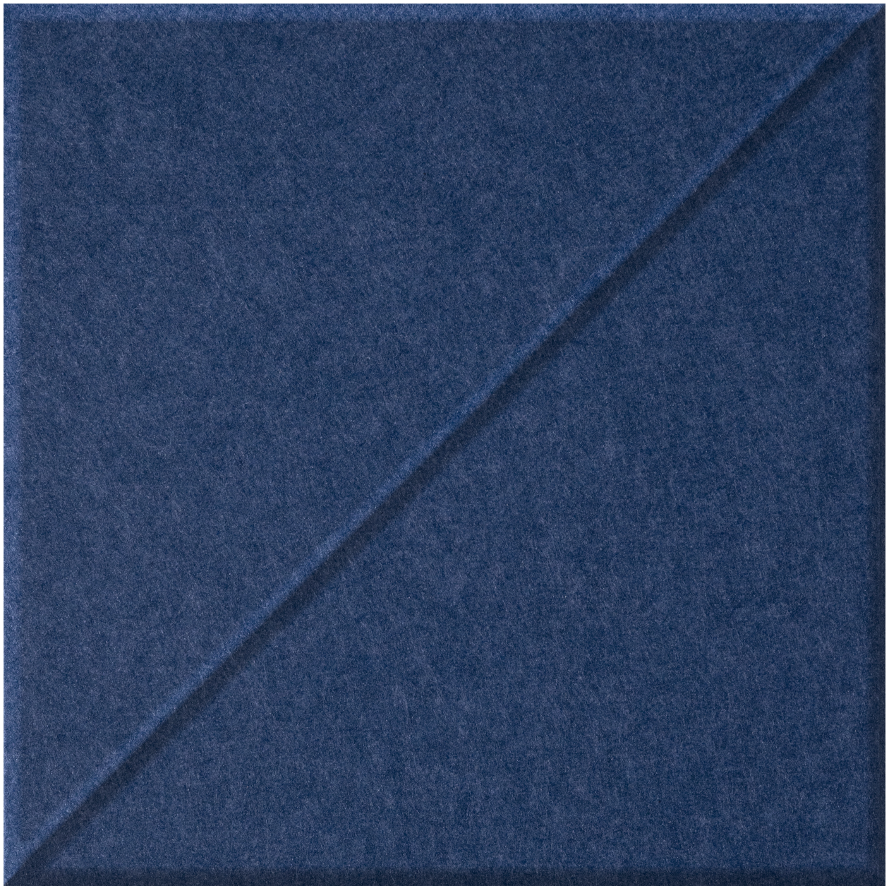 Dark blue tile with diagonal slash pattern dividing the surface into two sections.