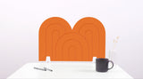 An orange arch-shaped desk divider on a white desk. For the side of your desk.