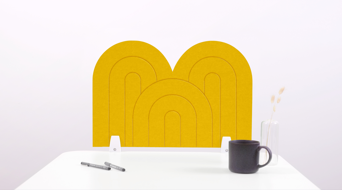 A dandelion yellow arch-shaped desk divider on a white desk. For the side of your desk.