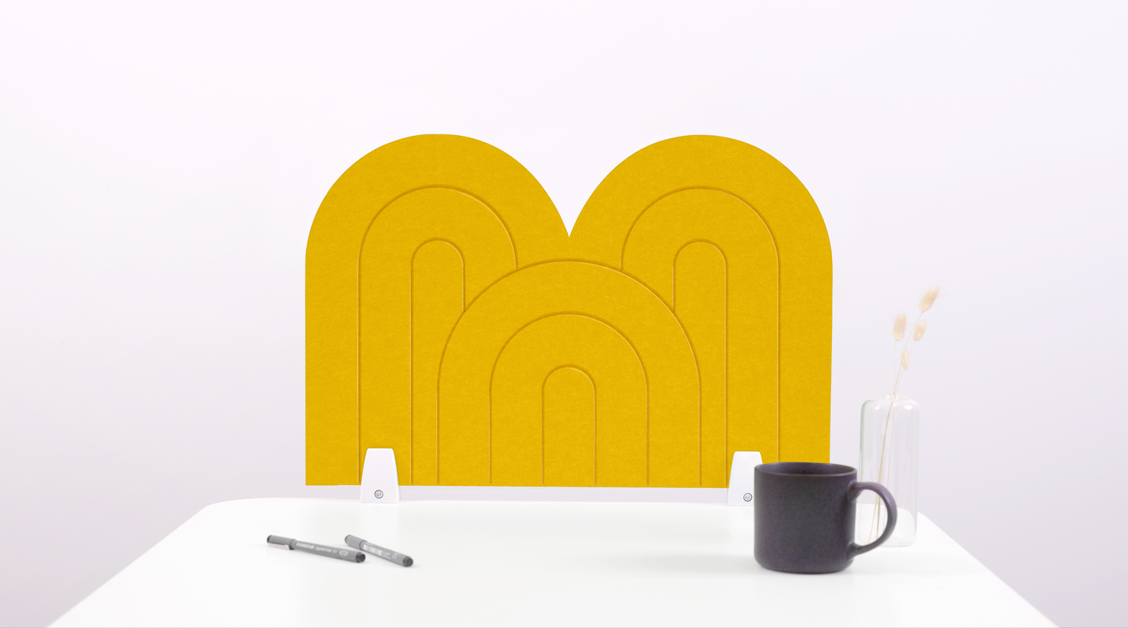 A dandelion yellow arch-shaped desk divider on a white desk. For the side of your desk.