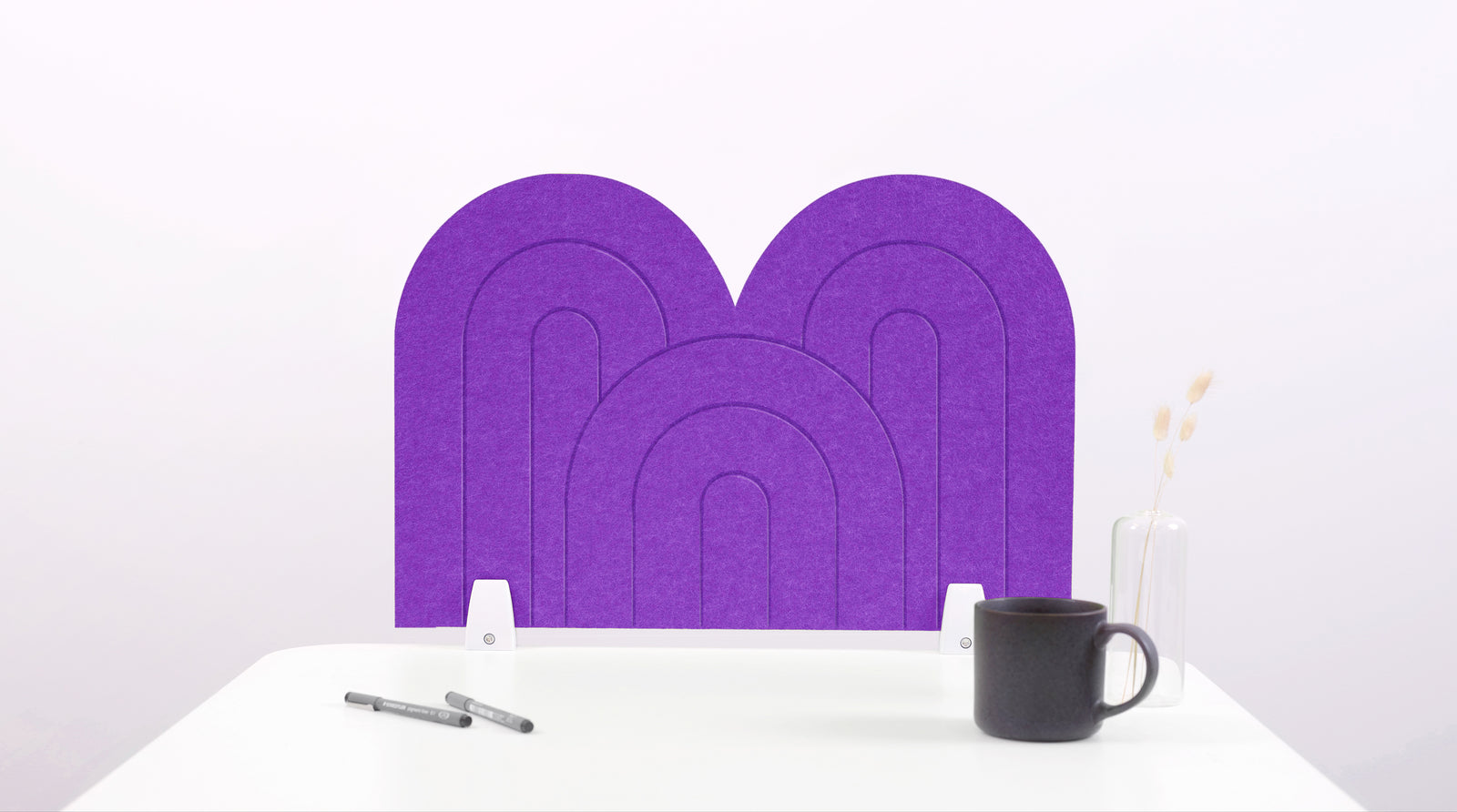A lavender arch-shaped desk divider on a white desk. For the side of your desk.