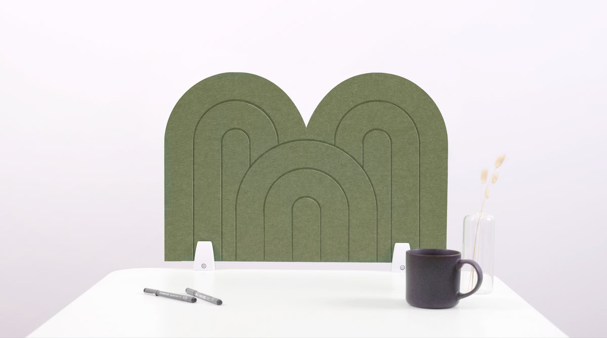 An olive arch-shaped desk divider on a white desk. For the side of your desk.