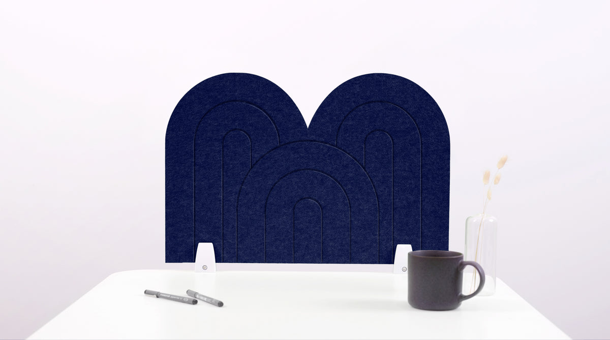 A purple arch-shaped desk divider on a white desk. For the side of your desk.