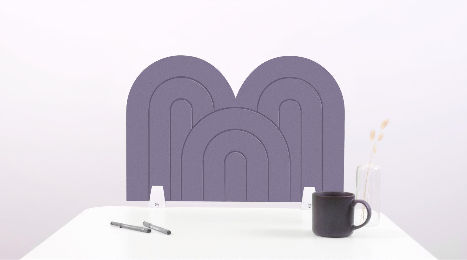 A light purple arch-shaped desk divider on a white desk. For the side of your desk.