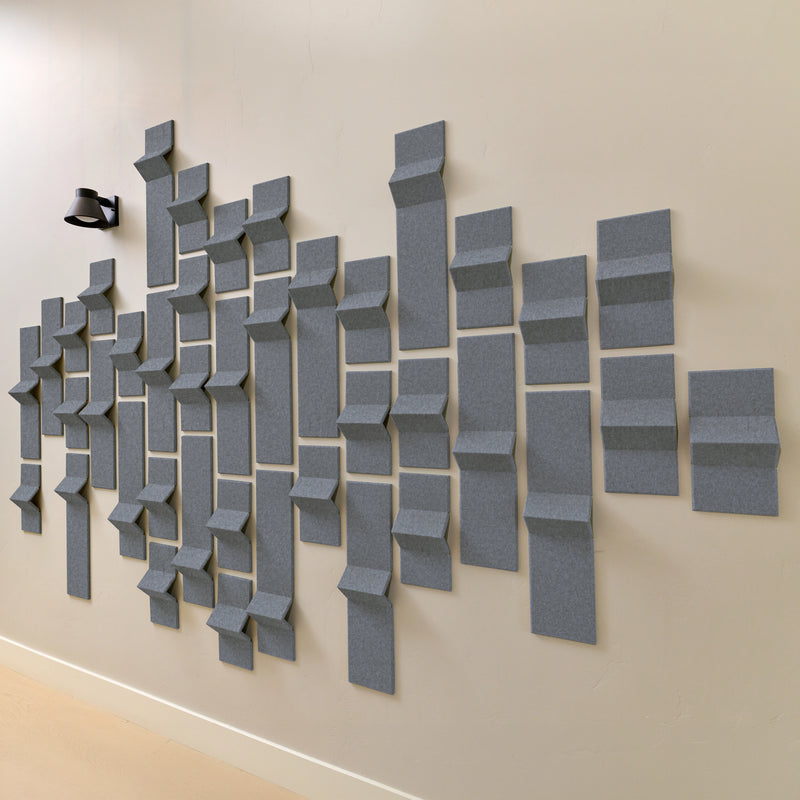 Grey felt tiles with 3D points creating an acoustic wall