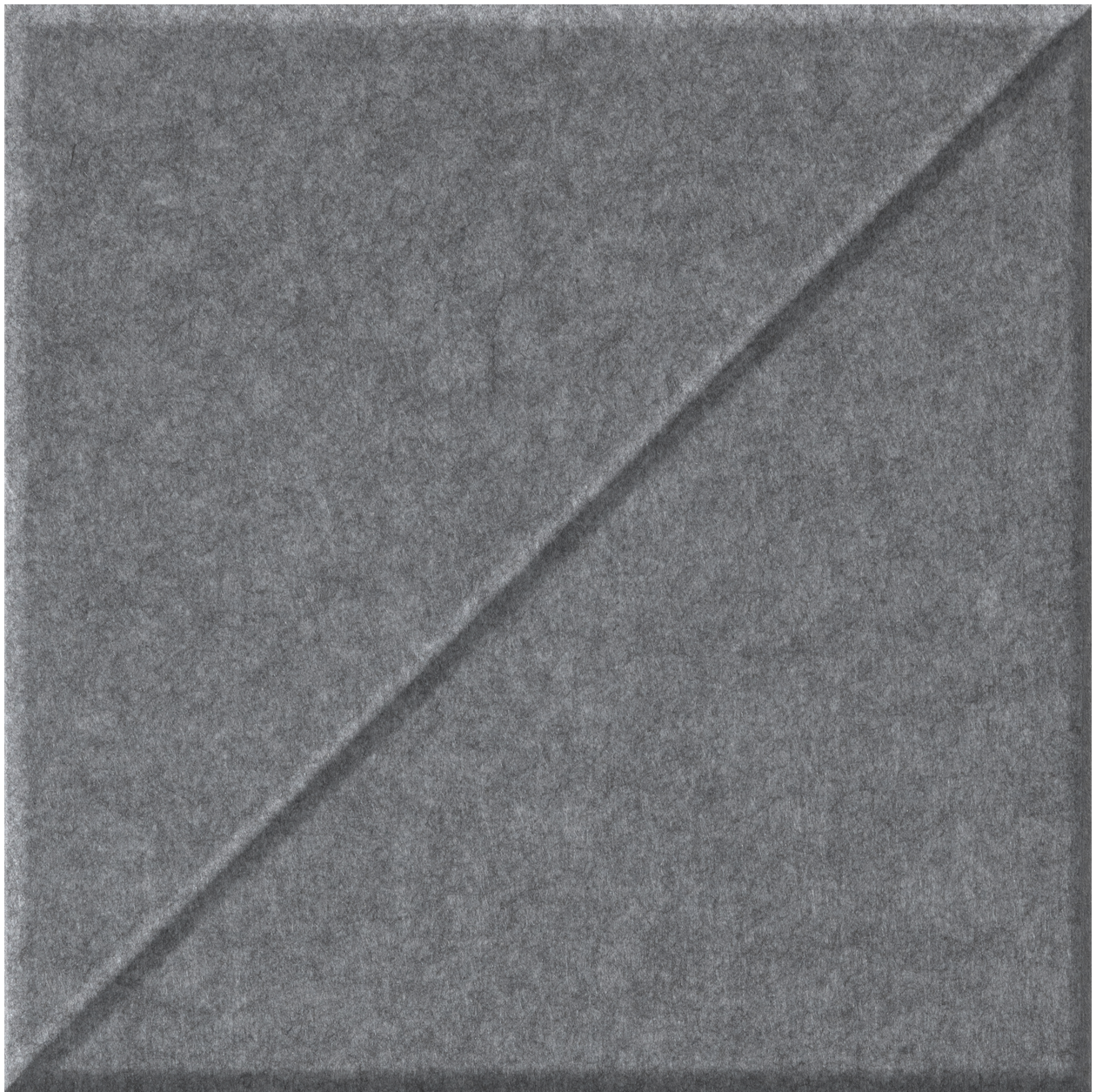 Gray tile with diagonal raised ridge pattern dividing the surface into two triangular sections.