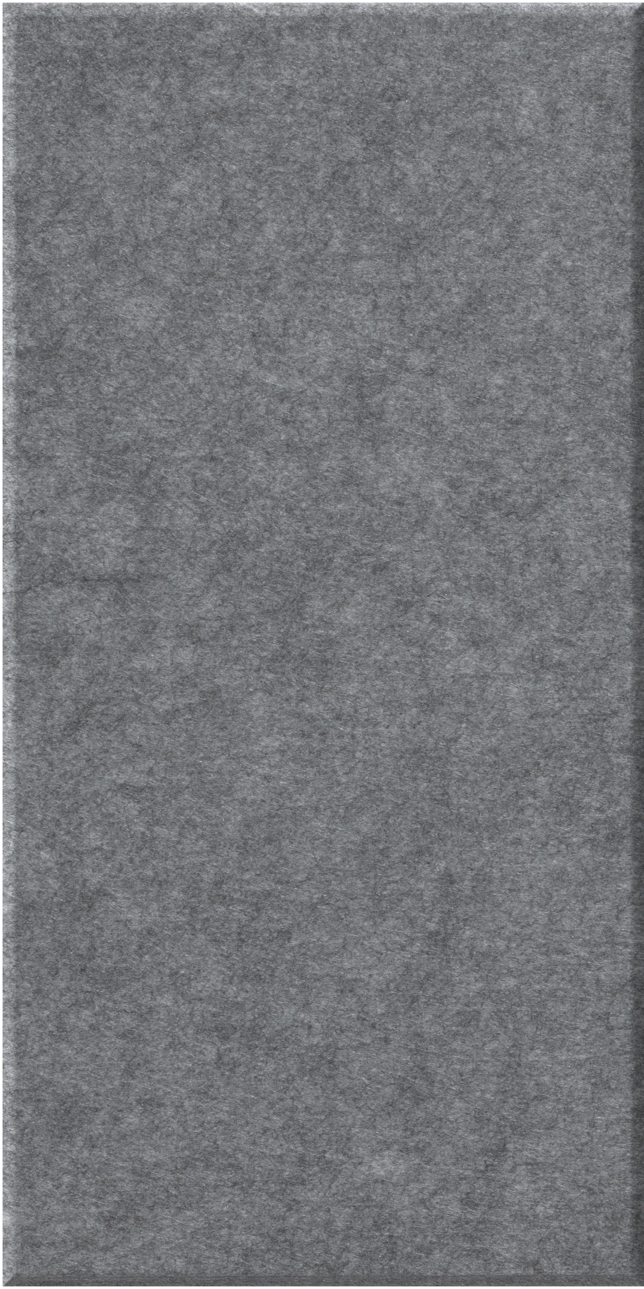 Gray halflap tile with textured stone finish in rectangular format.