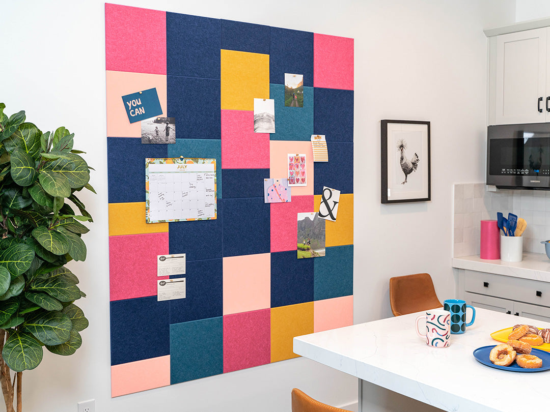 Colorful bulletin board with notes in a home office setting