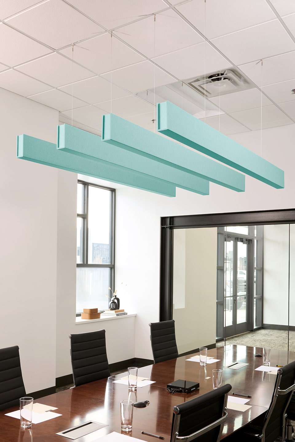 PET felt suspended acoustic beam in Baby Blue by Felt Right absorbs unwanted noise and looks great in any setting. Available in four or eight foot lengths. Clips into ACT grid or drills into drywall ceiling.