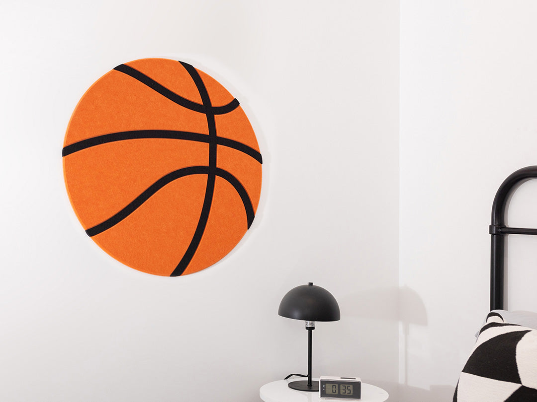 Basketball wall art next to bed