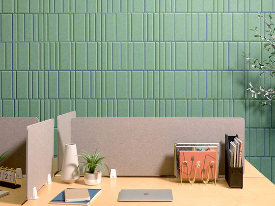 gray felt desk divider with green acoustic paneling 